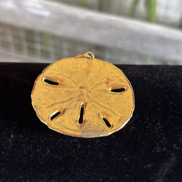 Sand Dollar Pendant Gold Tone, Seashell Beach Ocean Charm. 1 1/4” x 7/8”. - Picture 3 of 3